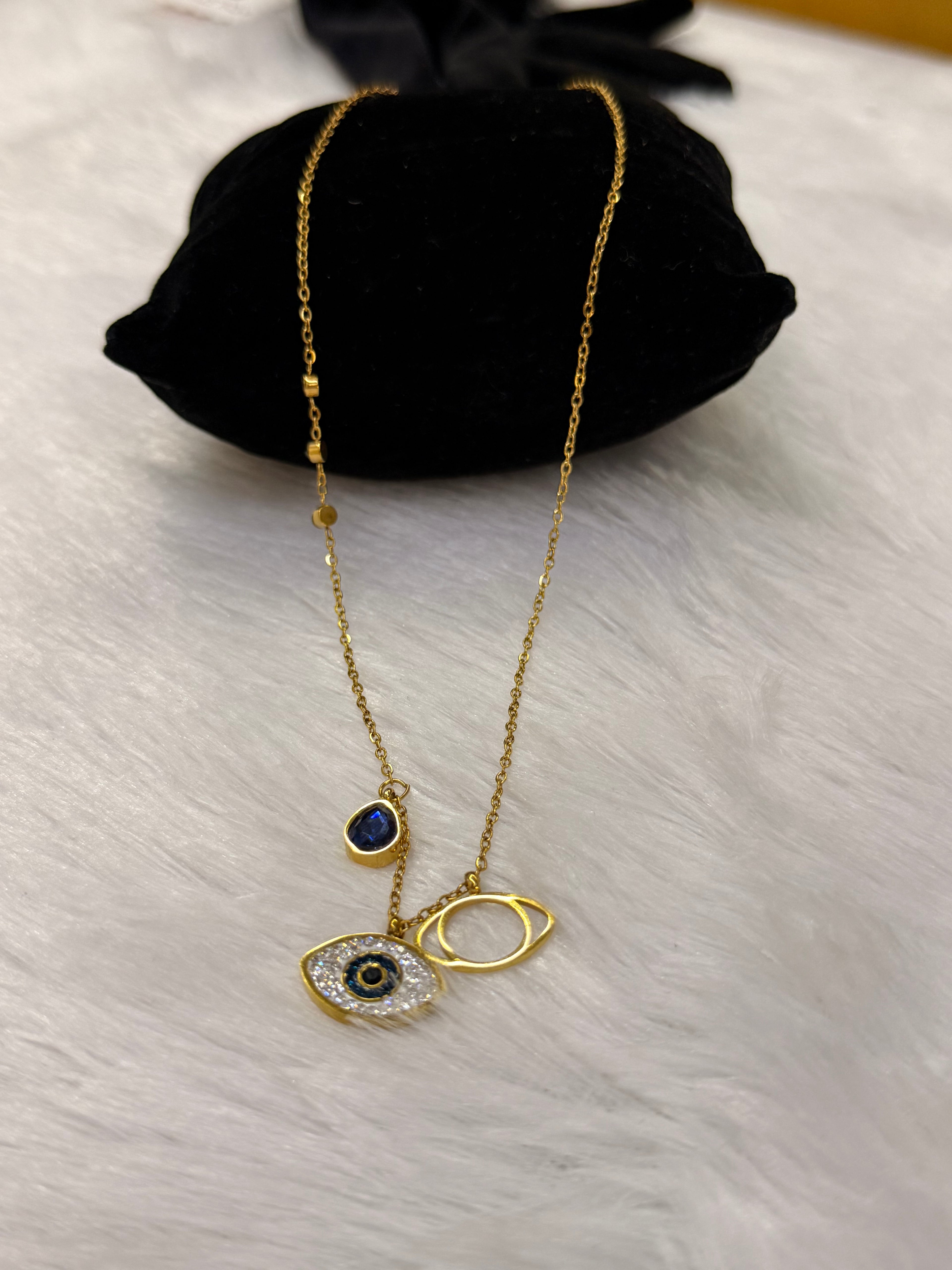 Evil eye stone pendant