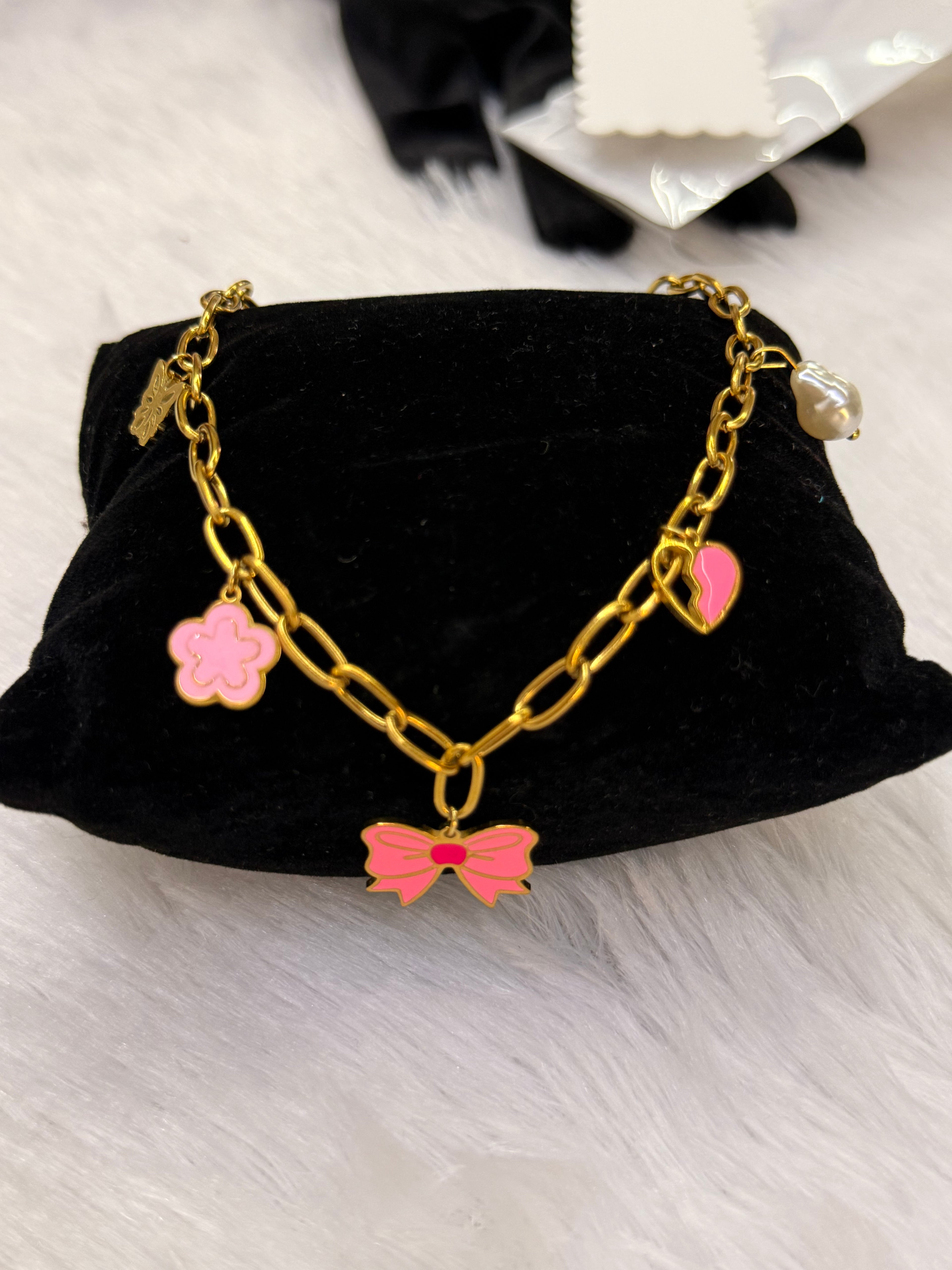 Pink charm bow necklace