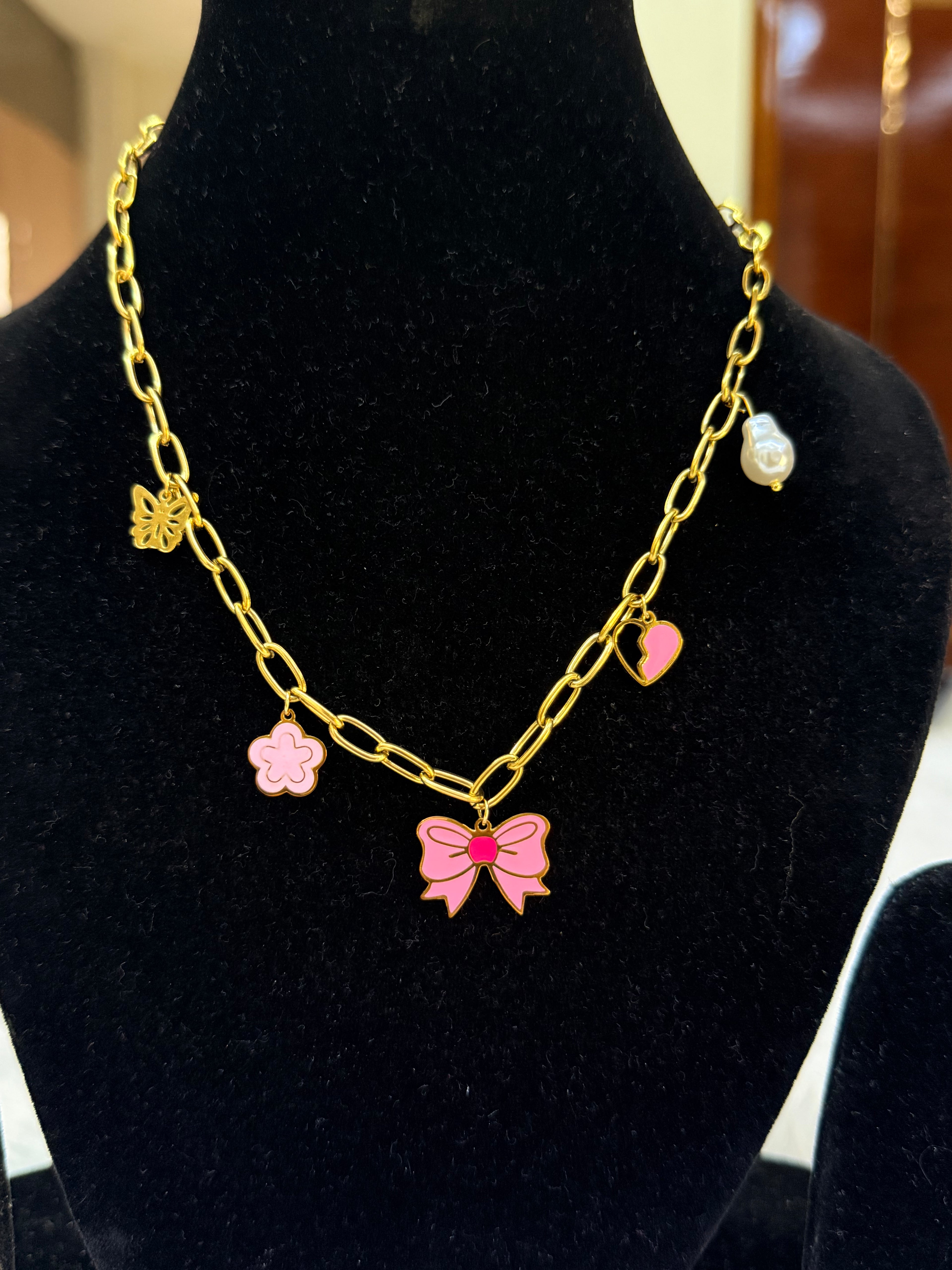 Pink charm bow necklace