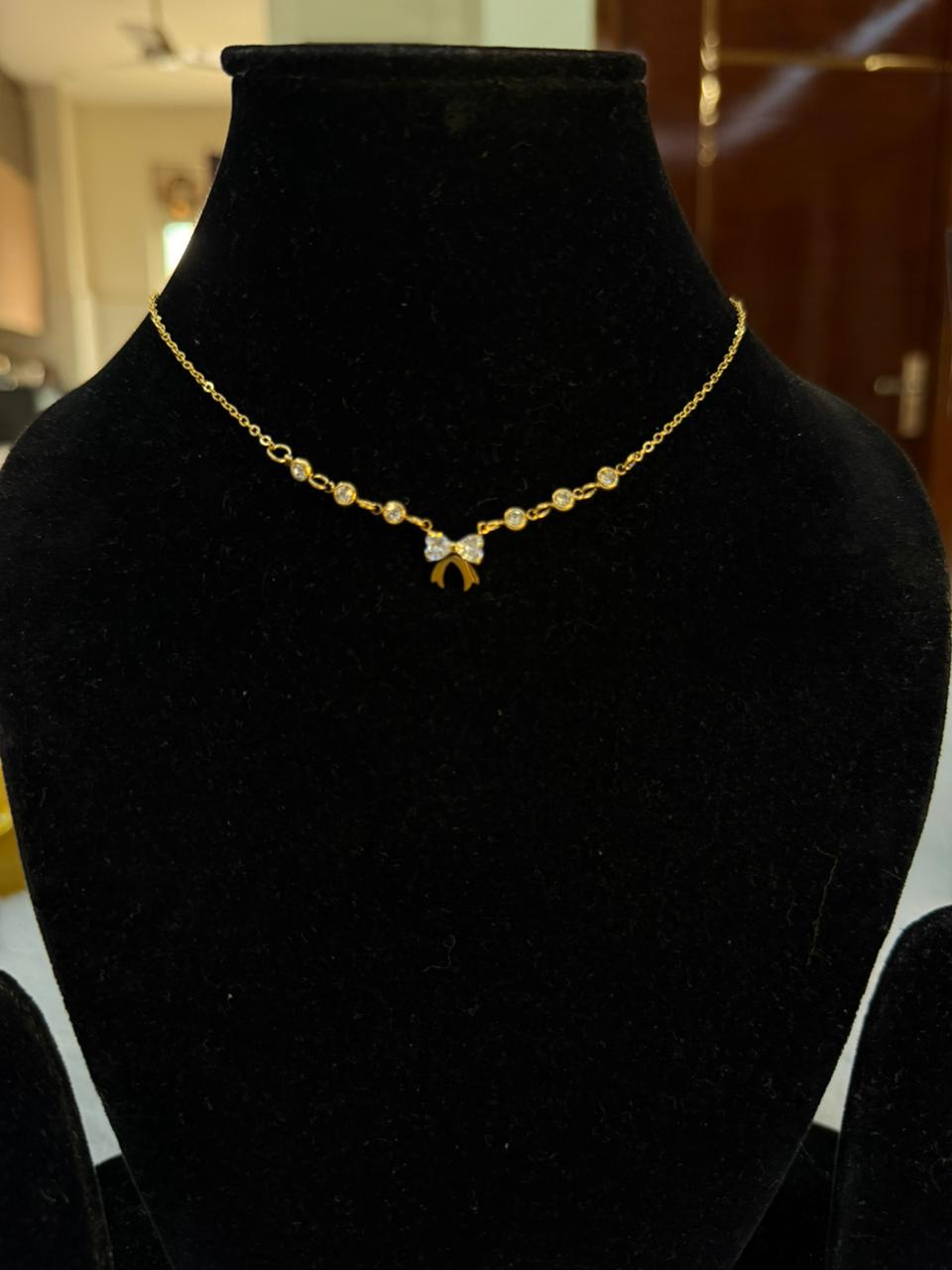 bow with diamond neckpiece