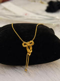 Hanging bow pendant